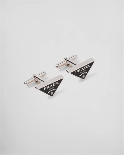 prada cufflinks|Prada tie bars.